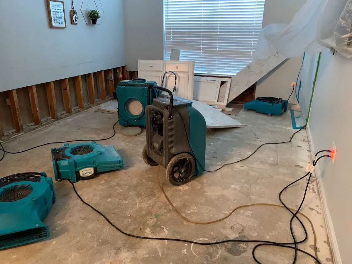Dehumidifier in flood-cut room for Water Damage Restoration in Palm Tree